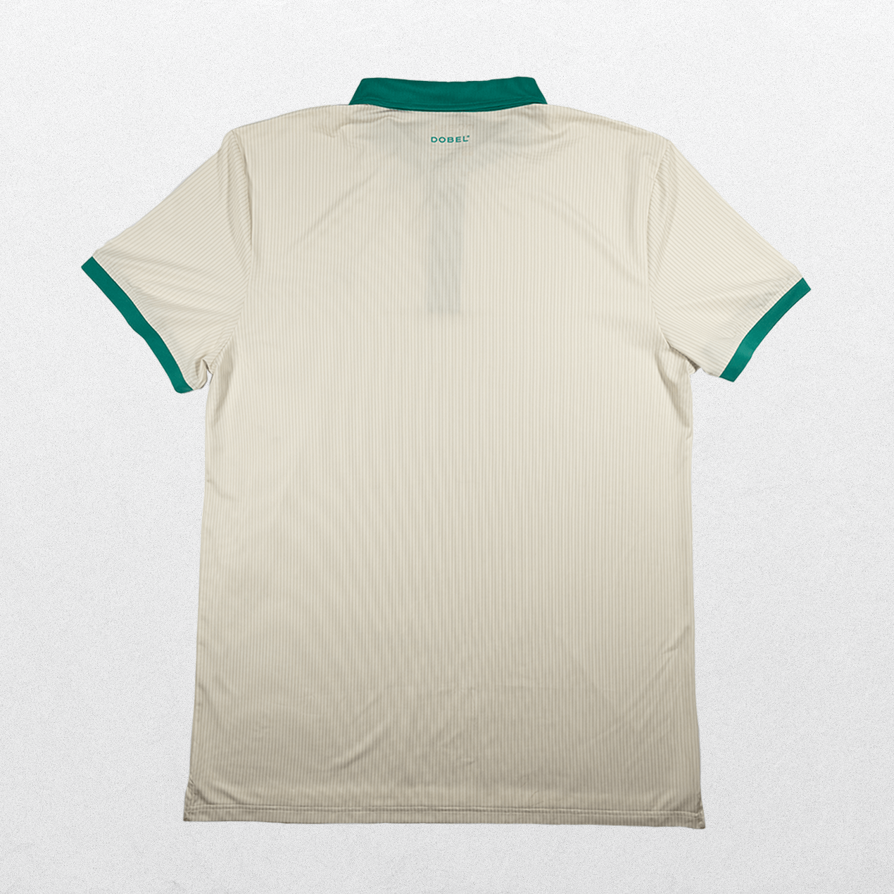 Back of cream polo with green trim details.