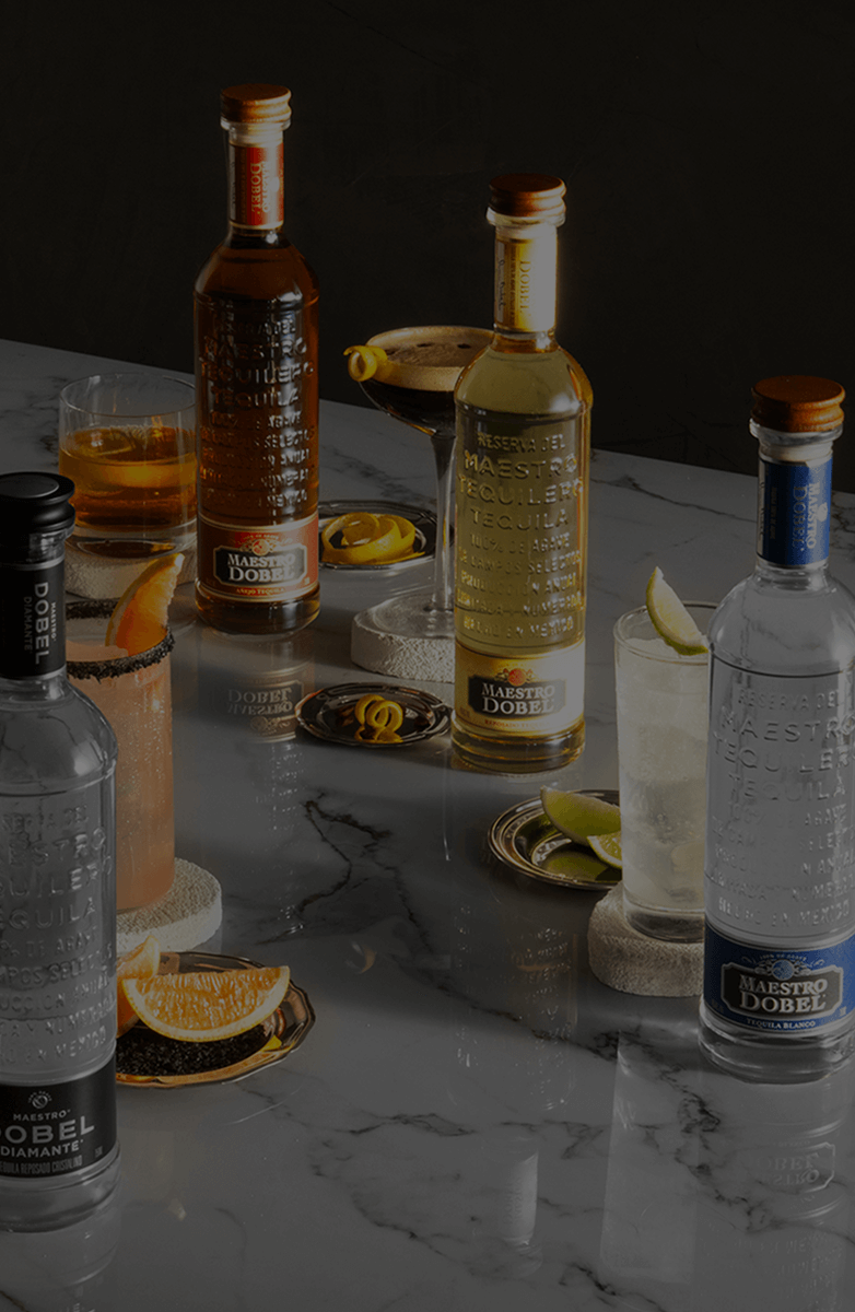 Dobel bottles with their respective signature cocktails