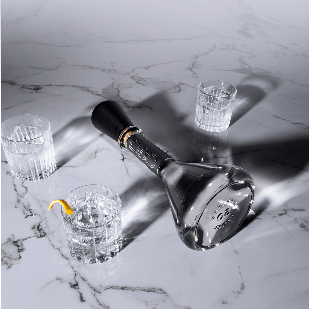 Dobel 50 Cristalino Extra Añejo bottle with black luxury case, premium presentation.