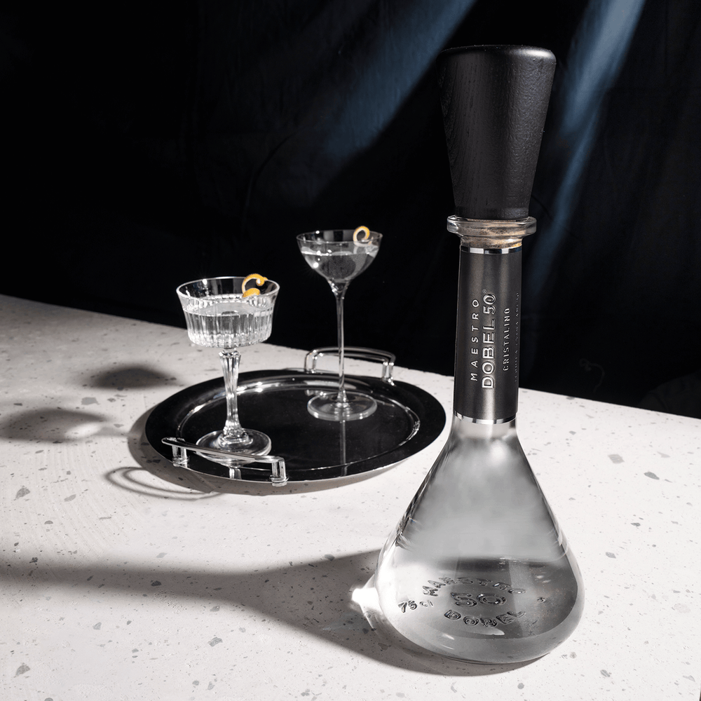 Dobel 50 Cristalino Extra Añejo highlights the intricate texture of its bottle cap and top design.