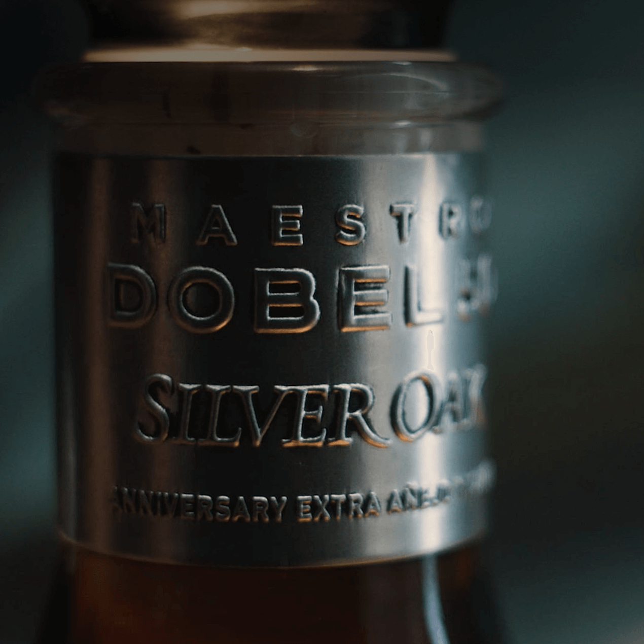 Dobel 50 Extra Añejo Silver Oak close-up of the engraved label on the bottle neck.