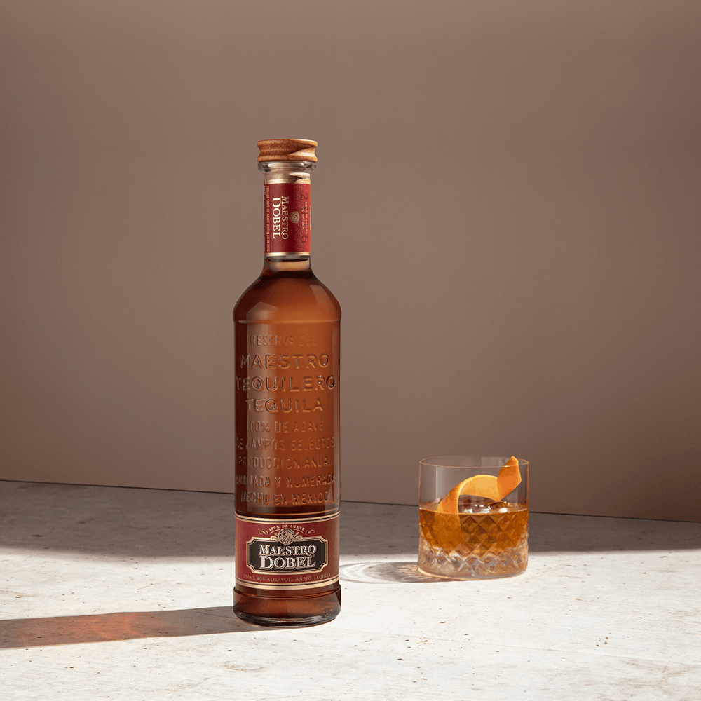Dobel Añejo with old fashioned glass and orange peel.
