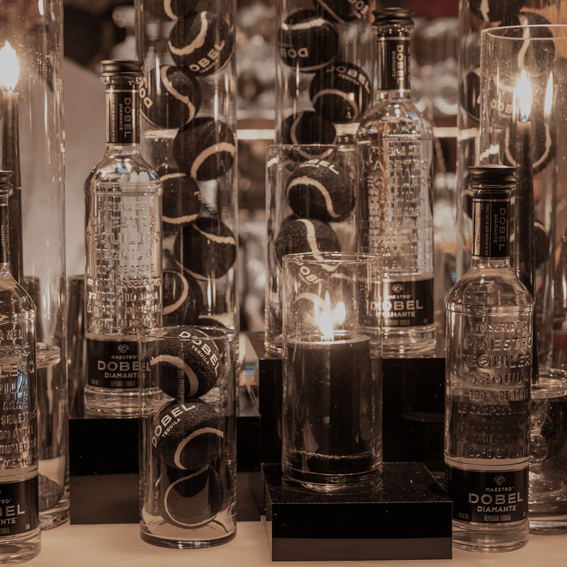 Dobel Diamante bottles and Dobel golf balls