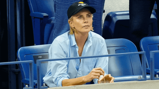 Charlize Theron watches the US Open in the Dobel suite, with an Ace Paloma in hand. Gotham/GC Images/Getty Images