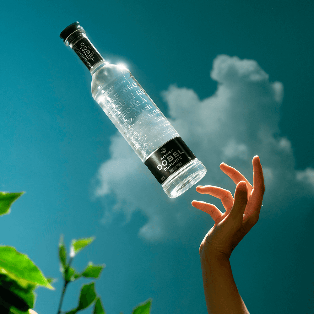 Dobel Diamante Cristalino bottle with sky in the spring