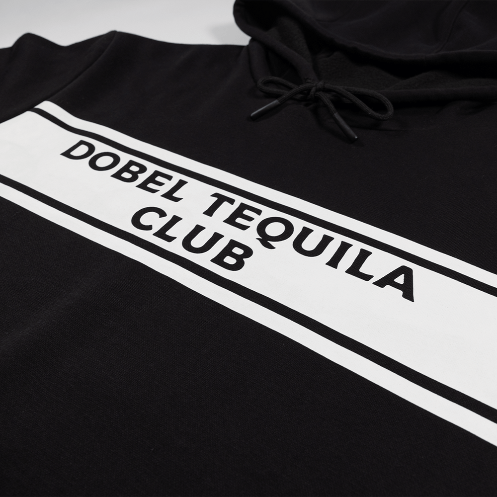Detail shot of Dobel Tequila Club graphic across chest.