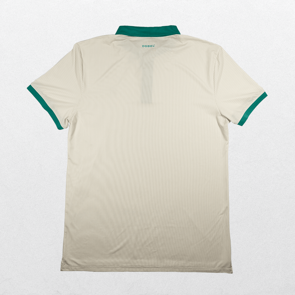 Back of cream polo with green trim details.