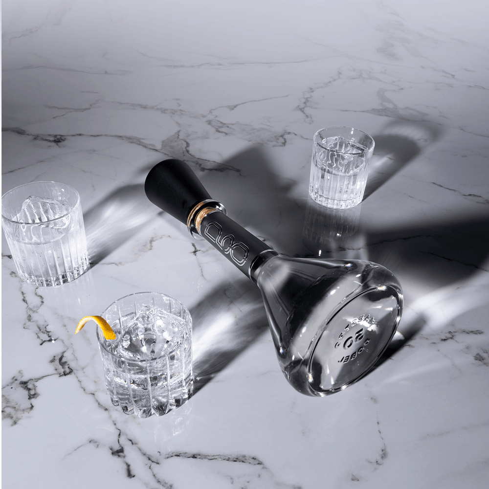 Dobel 50 Cristalino Extra Añejo bottle with black luxury case, premium presentation.