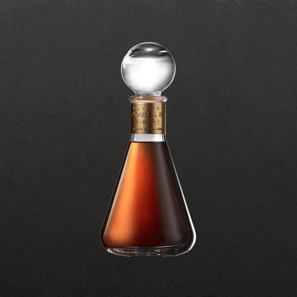 Dobel 50 Extra Añejo 1971 bottle with dark background.