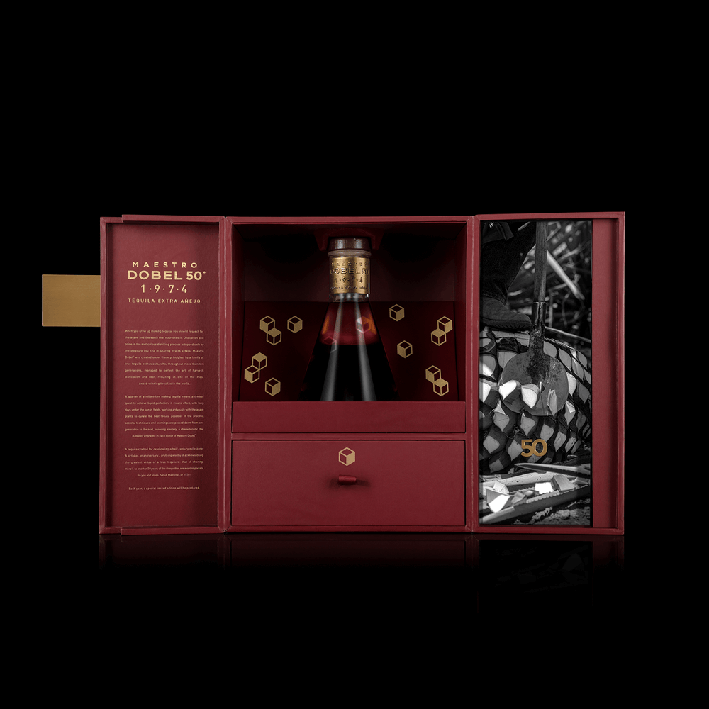 Dobel 50 Extra Añejo 1974 bottle with box opened.