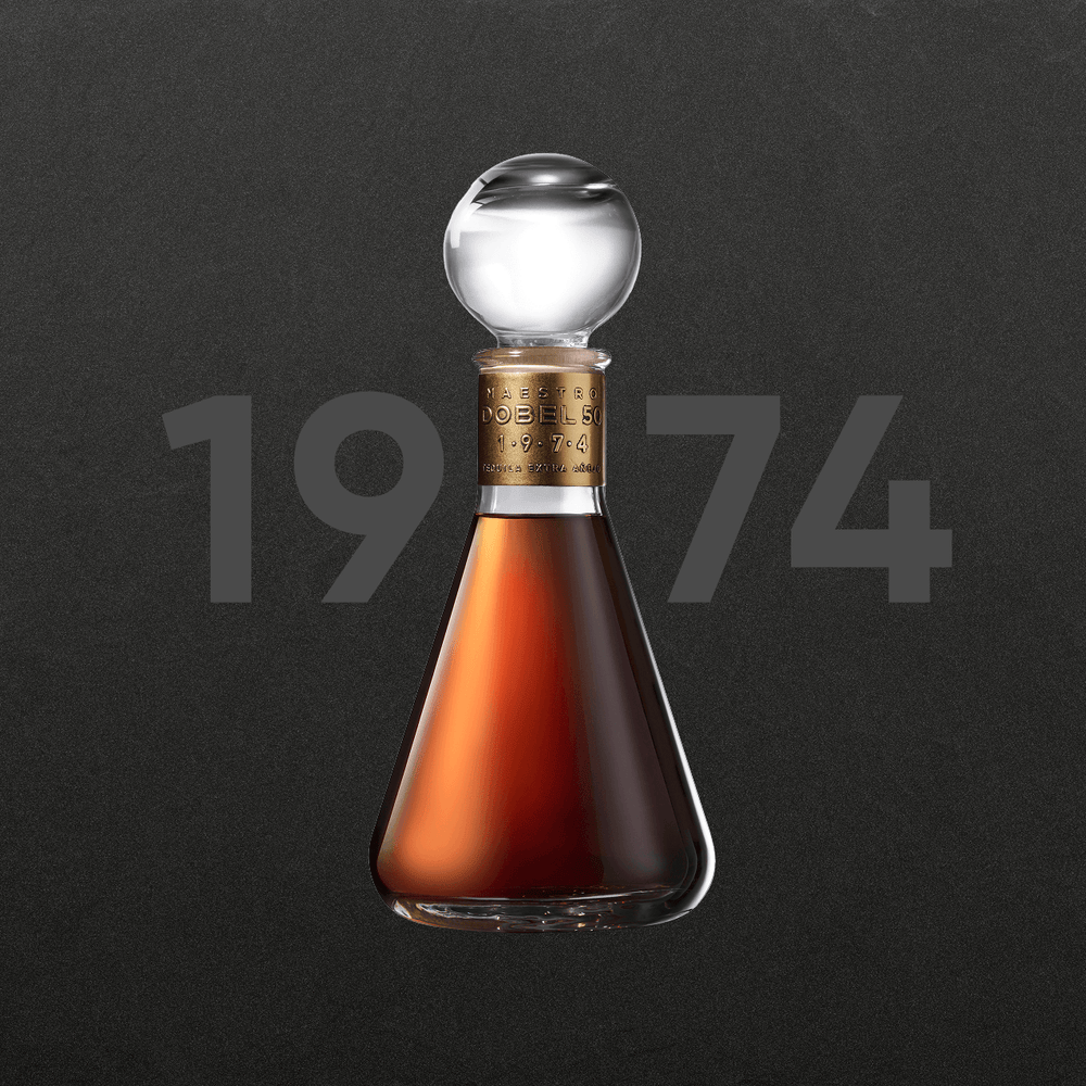 Dobel 50 Extra Añejo 1974 bottle with dark background.