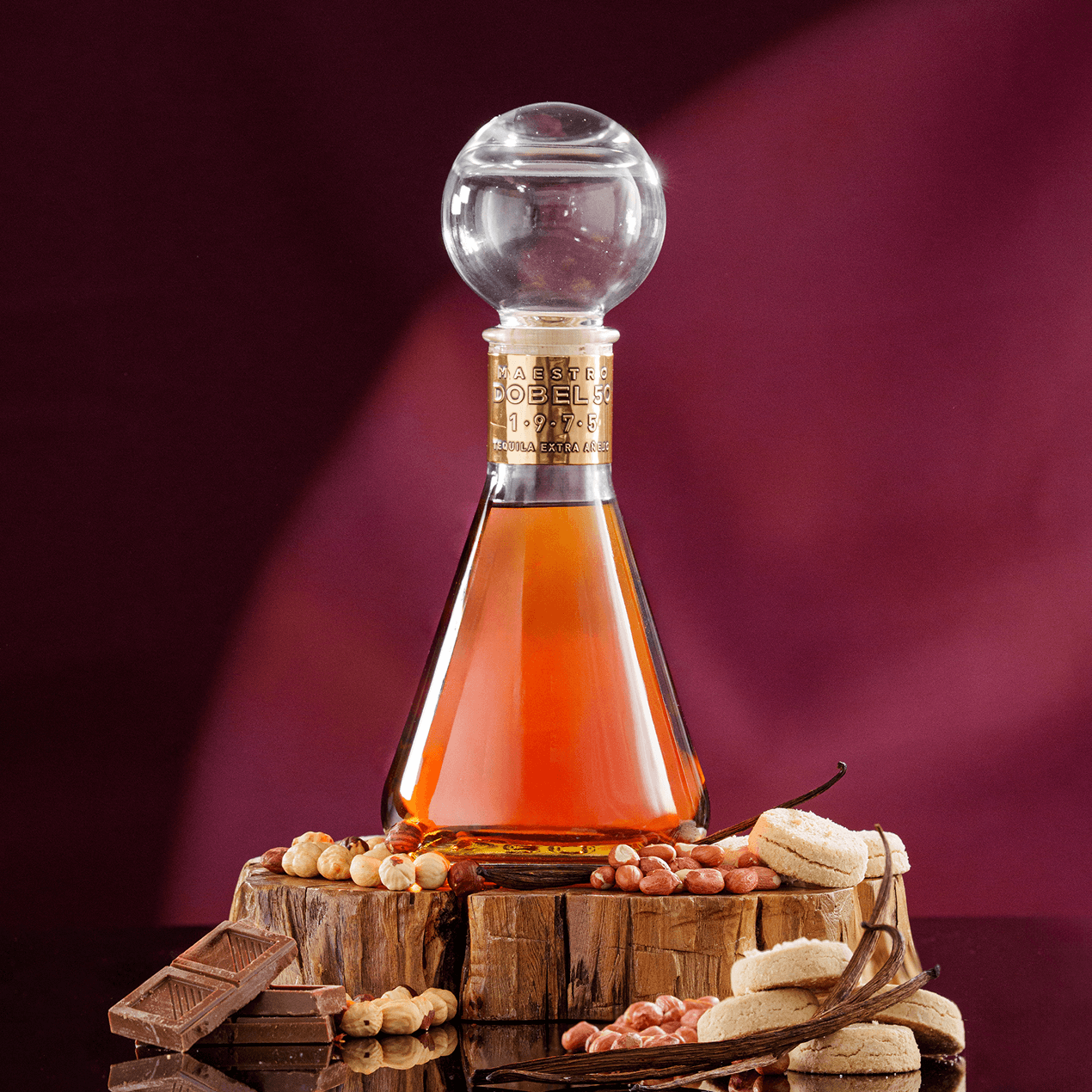 Dobel 50 Extra Añejo 1975 bottle with ingredient suggestions surrounding the bottle.