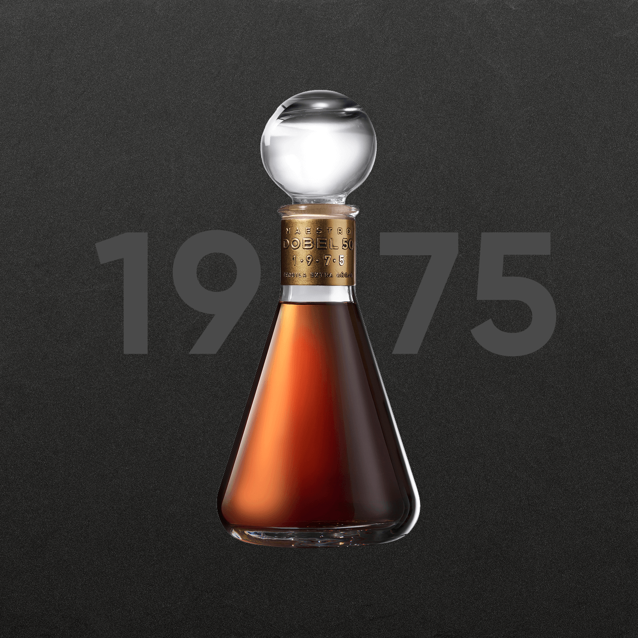 Dobel 50 Extra Añejo 1975 bottle with dark background.