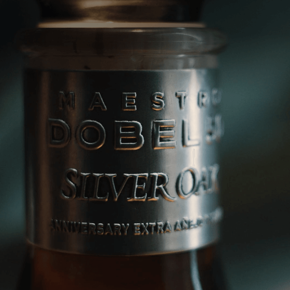 Dobel 50 Extra Añejo Silver Oak close-up of the engraved label on the bottle neck.
