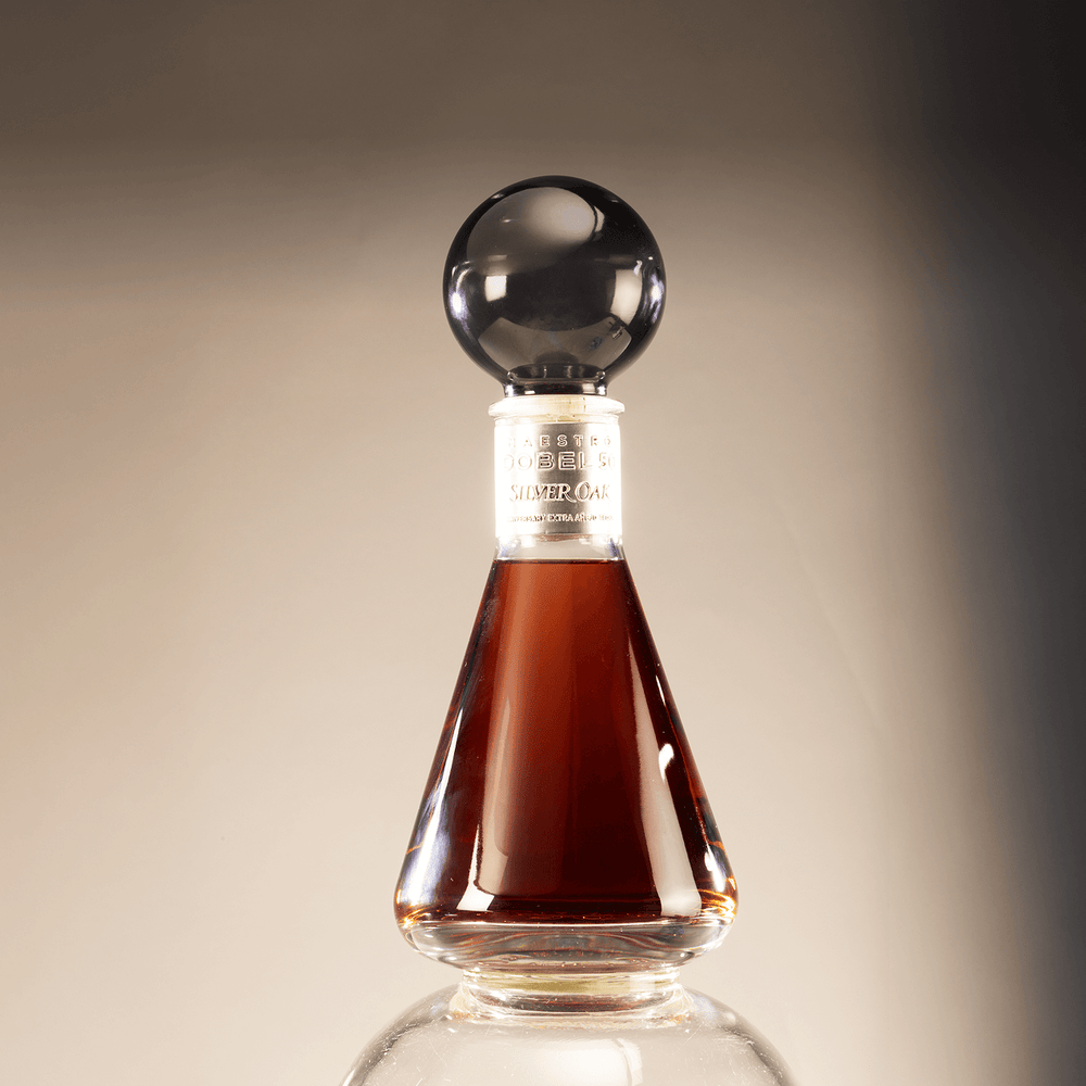 Dobel 50 Extra Añejo Silver Oak bottle solo on a light colored background.