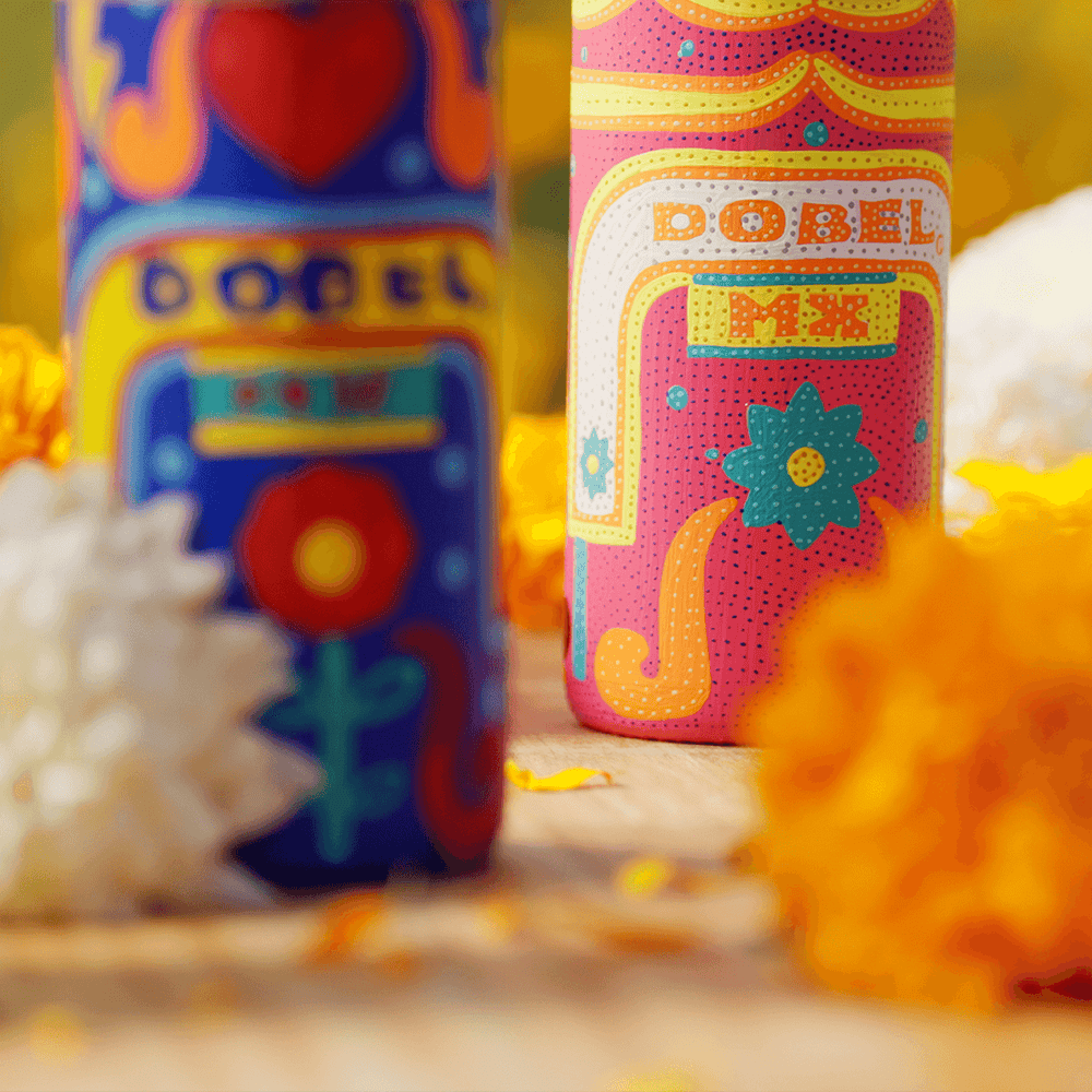 Dobel Atelier: Trajineras Edition detailed view of colorful bottles with flowers.